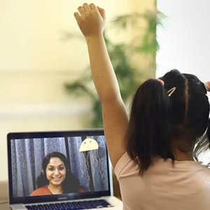 Online learning , girl raising hand